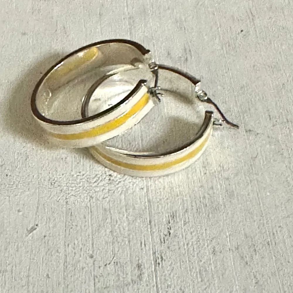 Chaps silver tone yellow and white hoop earrings